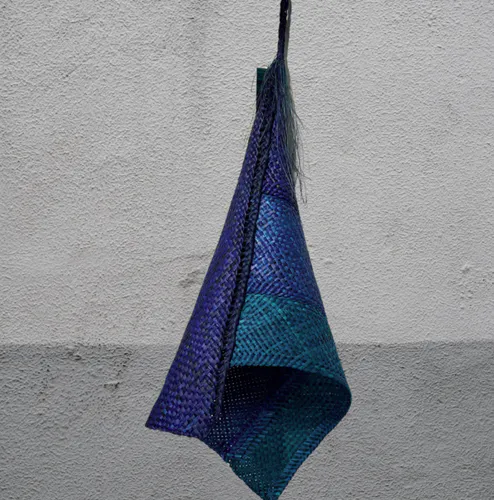 Handwoven dyed Harakeke traditional Maori Hinaki by New Zealand artist Bernie Ross, available at The Little Gallery Whangamata